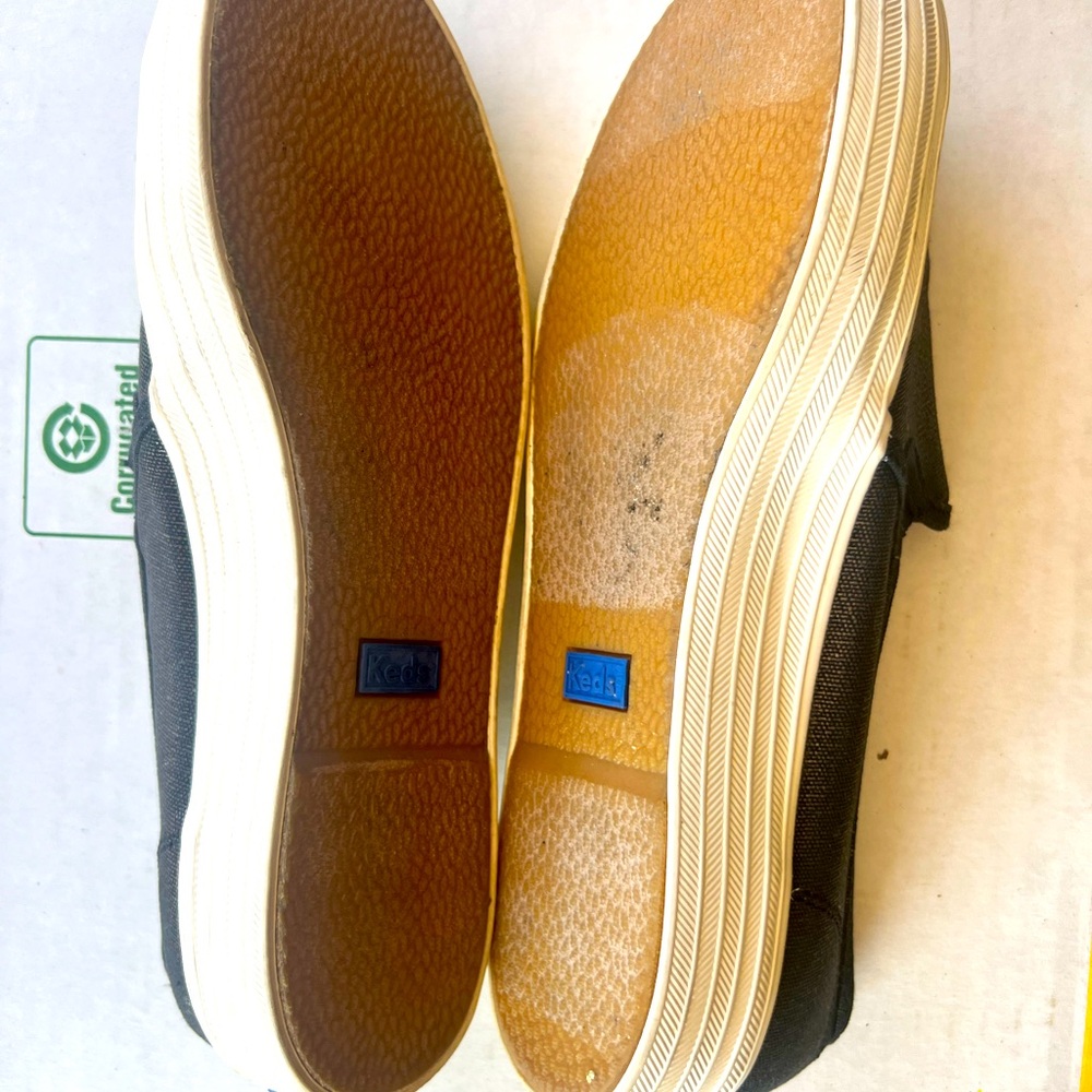 Keds. Platform slip-on shoe. Metallic black
